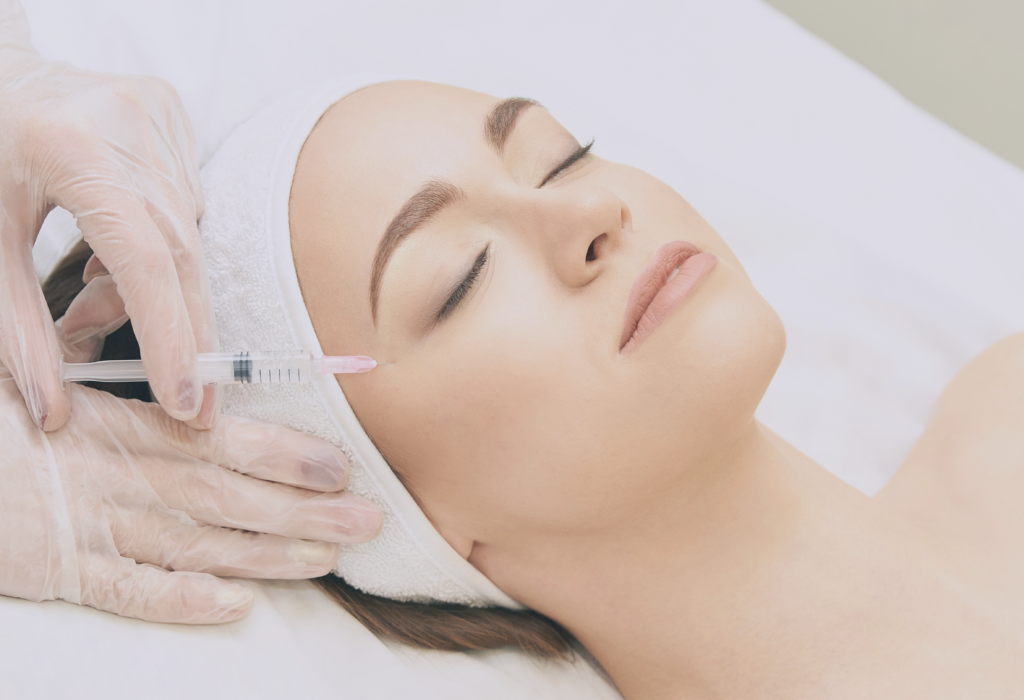 Inject Anti Wrinkle injection on a client face