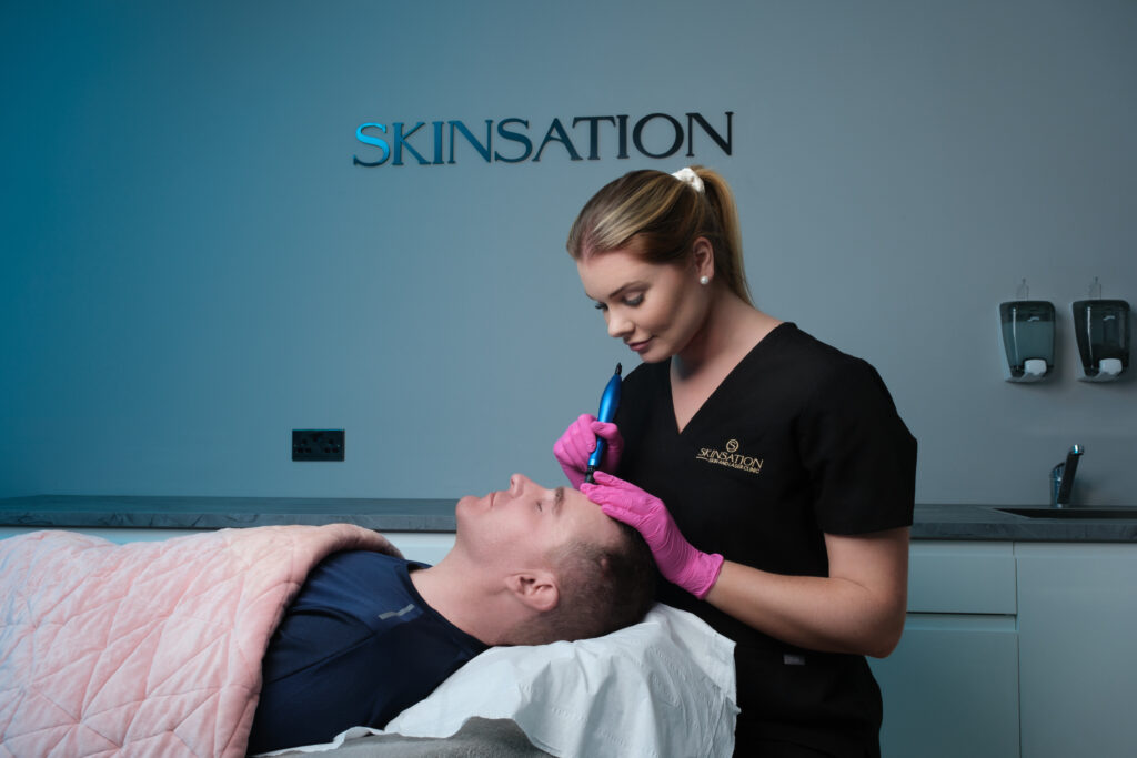 Sinead perform microneedling with blue lighting landscape Treatment on client Face
